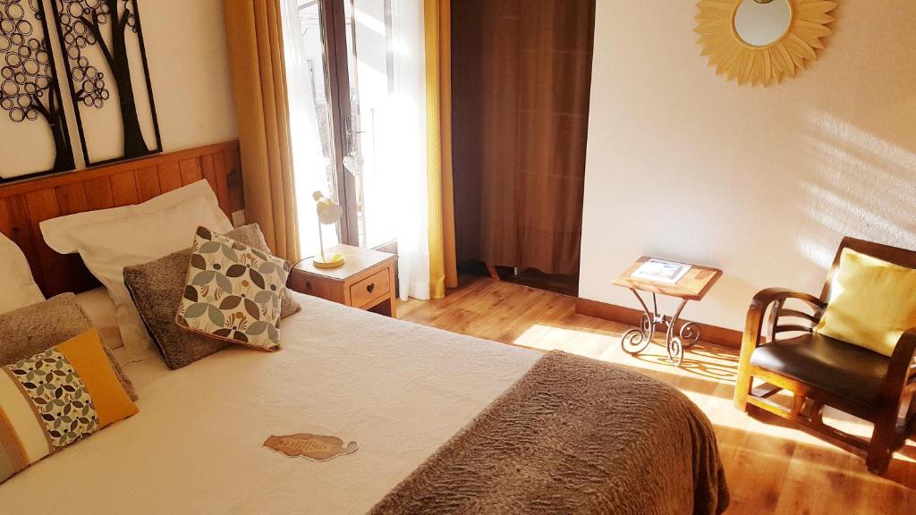 Postel nebo postele na pokoji v ubytování "La Coustille" Chambres et Table d'Hôtes