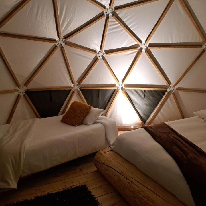 Postel nebo postele na pokoji v ubytování La Meca Glamping