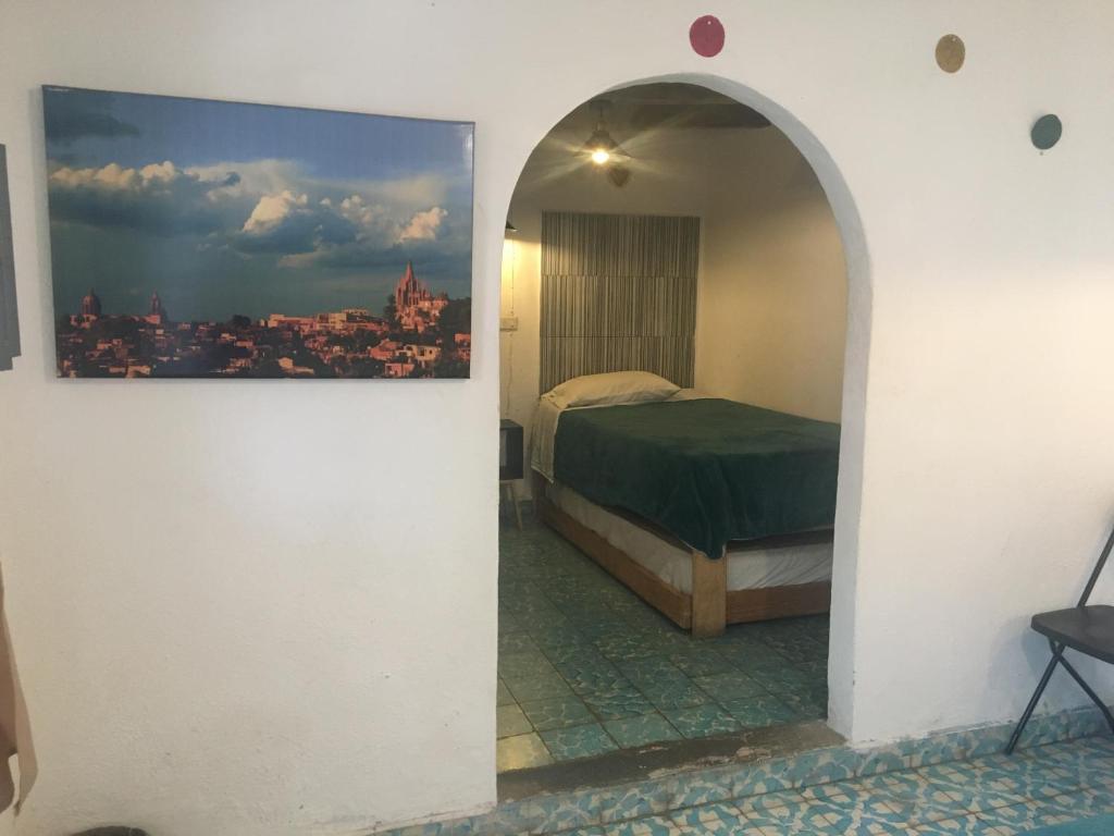 Postel nebo postele na pokoji v ubytování PATIO Alojamiento