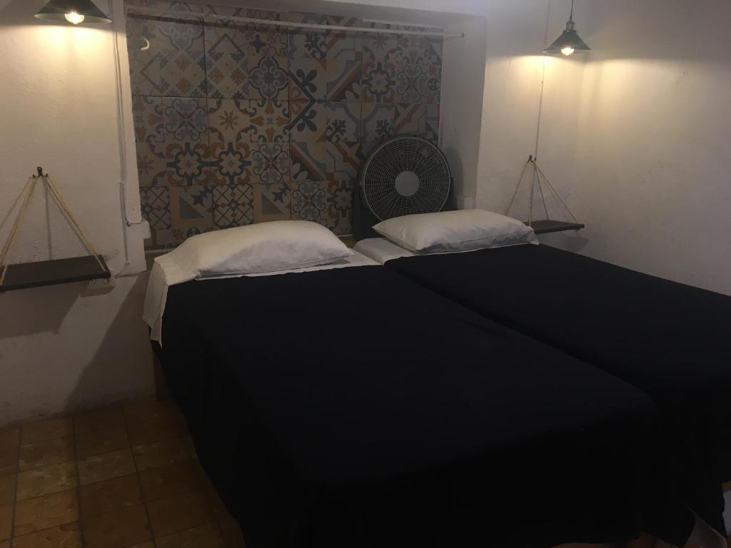 Postel nebo postele na pokoji v ubytování PATIO Alojamiento