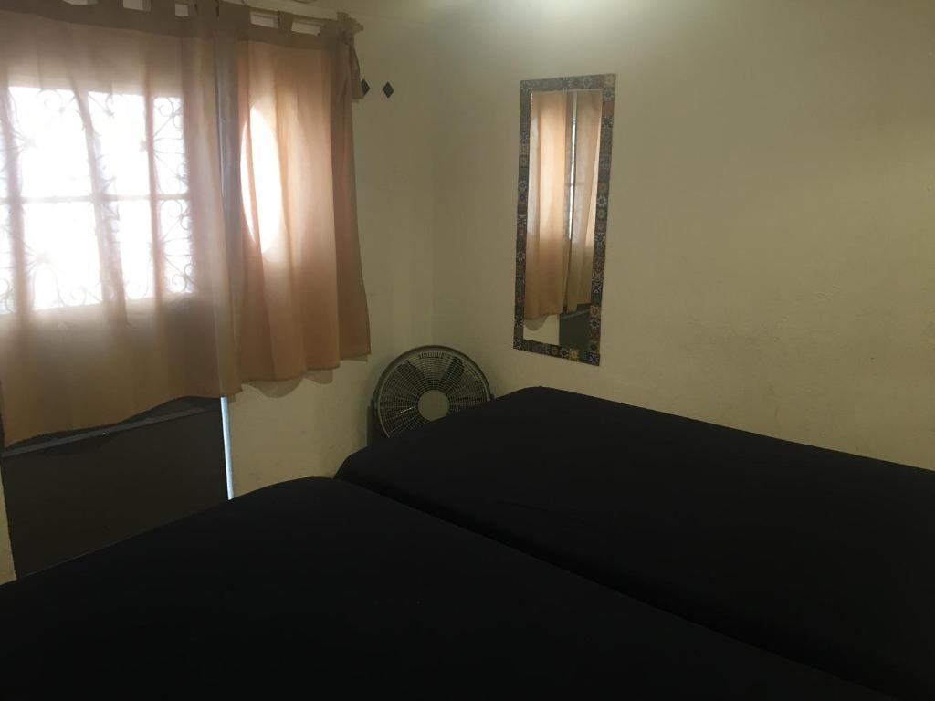 Postel nebo postele na pokoji v ubytování PATIO Alojamiento