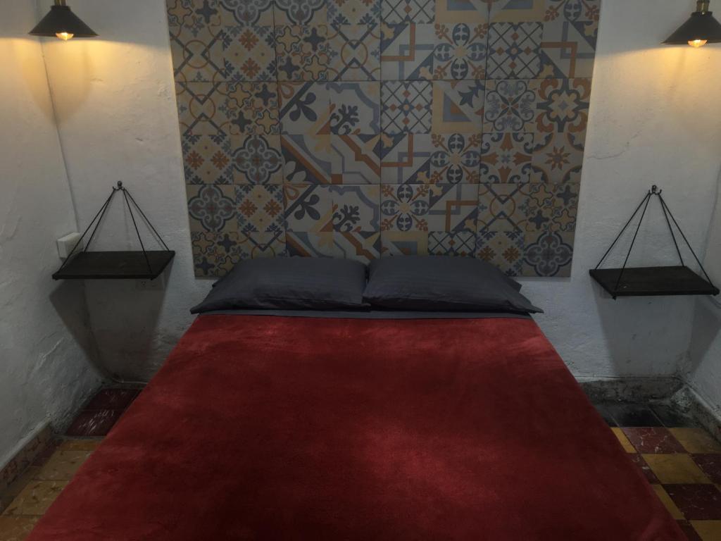 Postel nebo postele na pokoji v ubytování PATIO Alojamiento