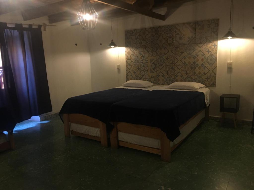 Postel nebo postele na pokoji v ubytování PATIO Alojamiento