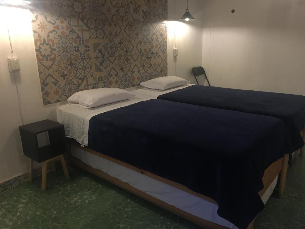 Postel nebo postele na pokoji v ubytování PATIO Alojamiento