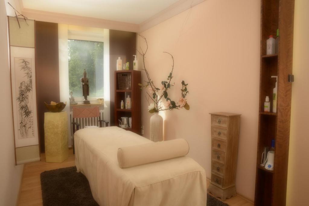 Postel nebo postele na pokoji v ubytování Hotel Kaiseralm