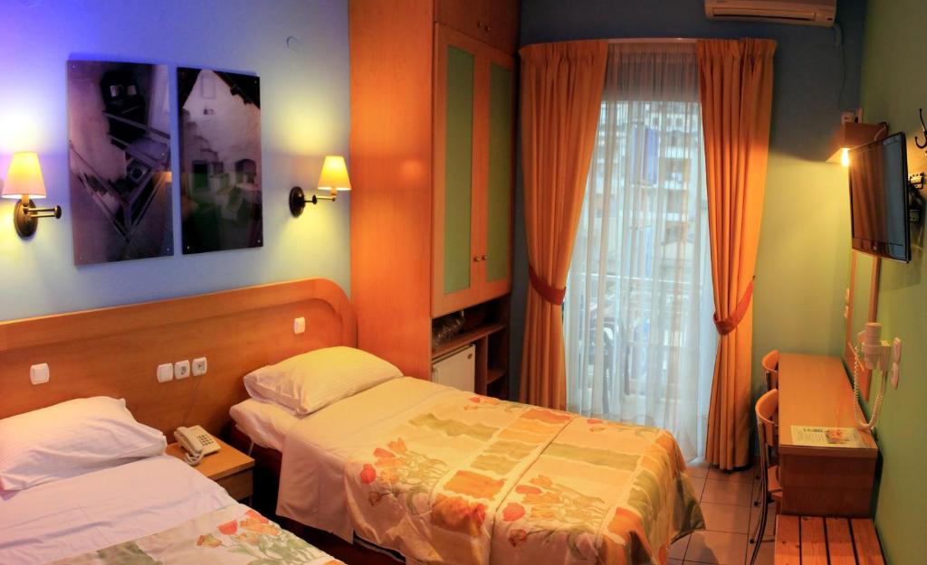 Postel nebo postele na pokoji v ubytování Hotel Segas