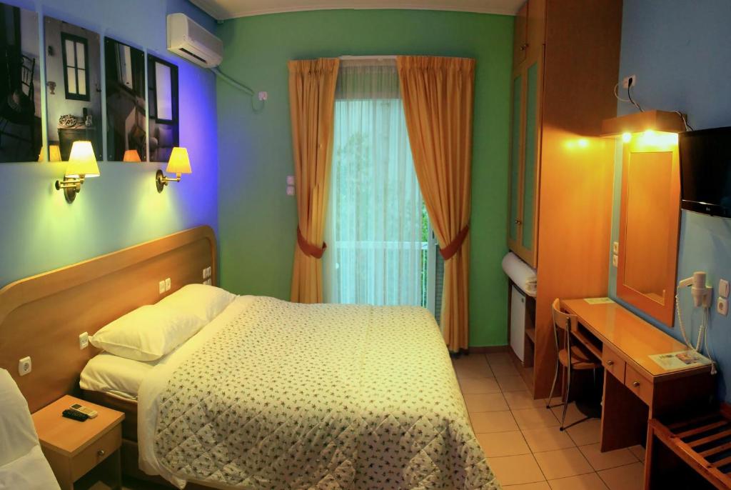 Postel nebo postele na pokoji v ubytování Hotel Segas
