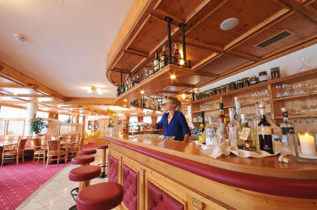 Nápoje v ubytovaní Hotel Asterbel