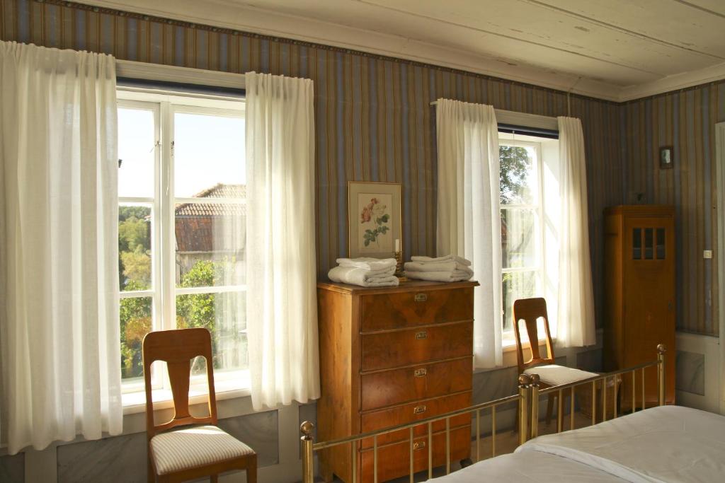 Postel nebo postele na pokoji v ubytování Frägsta Hälsingegård B&B