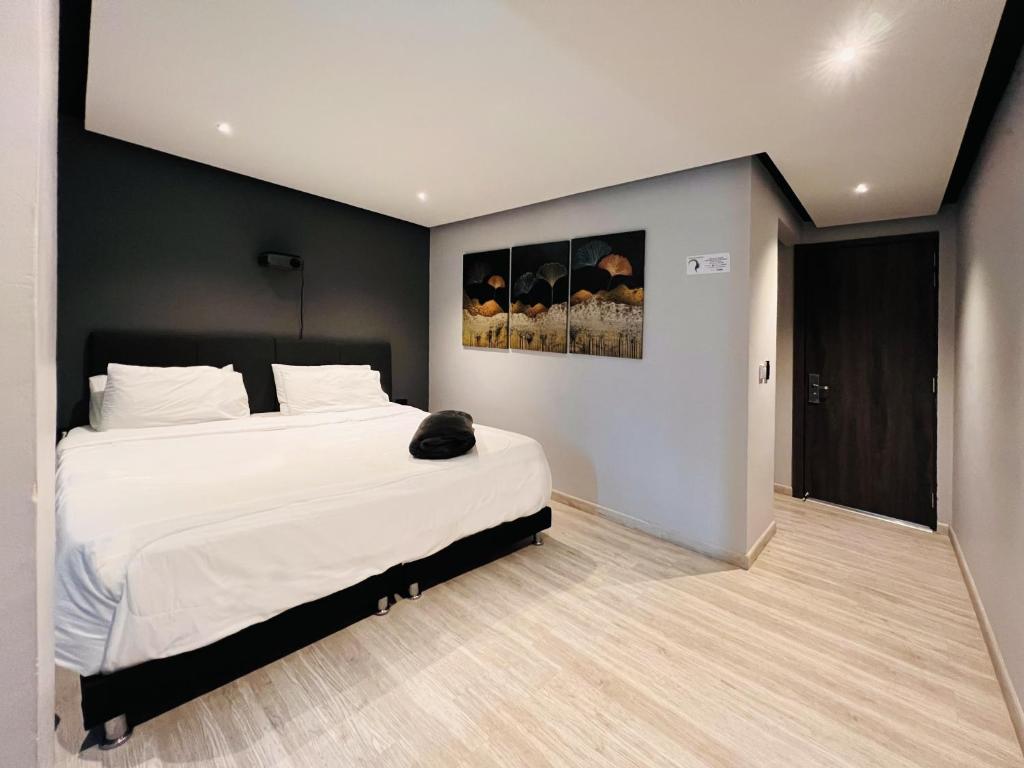 Postel nebo postele na pokoji v ubytování HOTEL HTL