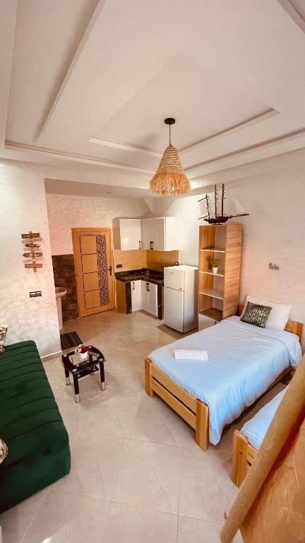 Postel nebo postele na pokoji v ubytování WOW beach house