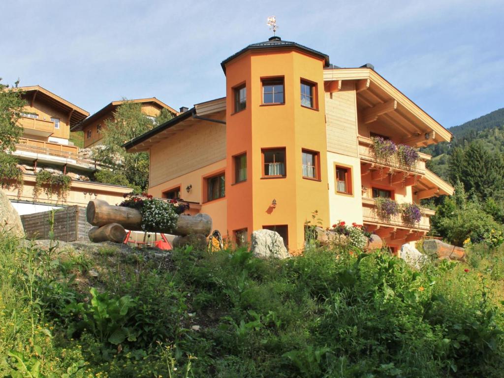 a house on the side of a mountain at Zirmblick in Saalbach-Hinterglemm