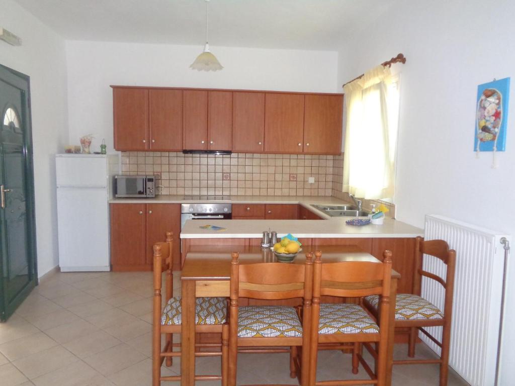 Kuchyňa alebo kuchynka v ubytovaní Riverside Αpartments