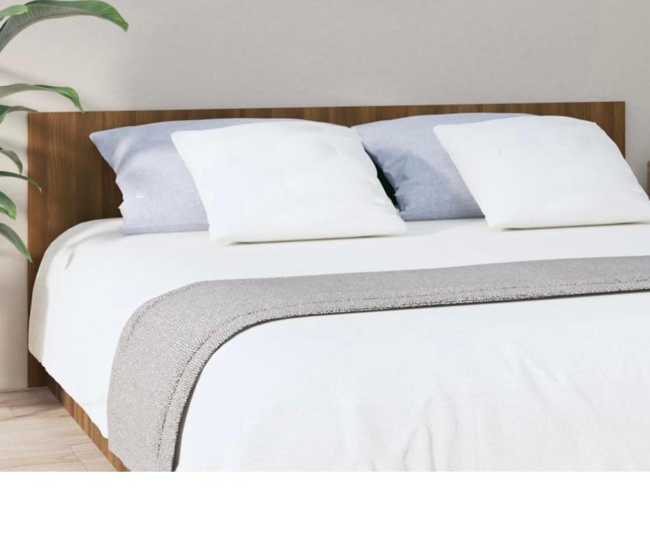 Łóżko lub łóżka w pokoju w obiekcie Smart Silver Apartment Central