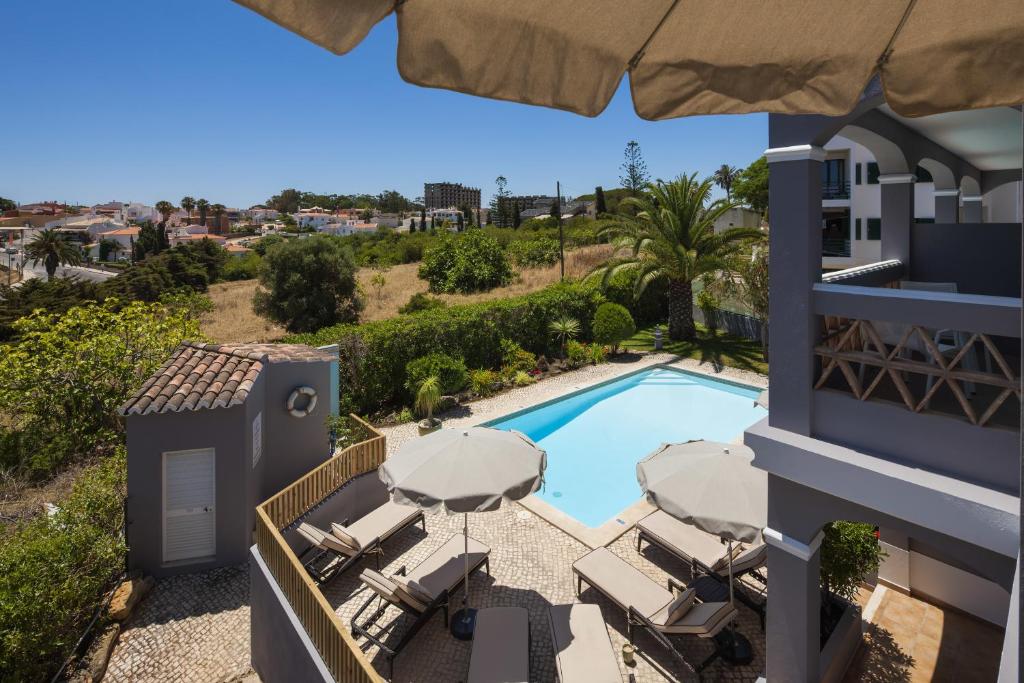 an aerial view of a villa with a swimming pool at Costa d'Oiro Ambiance Village in Lagos