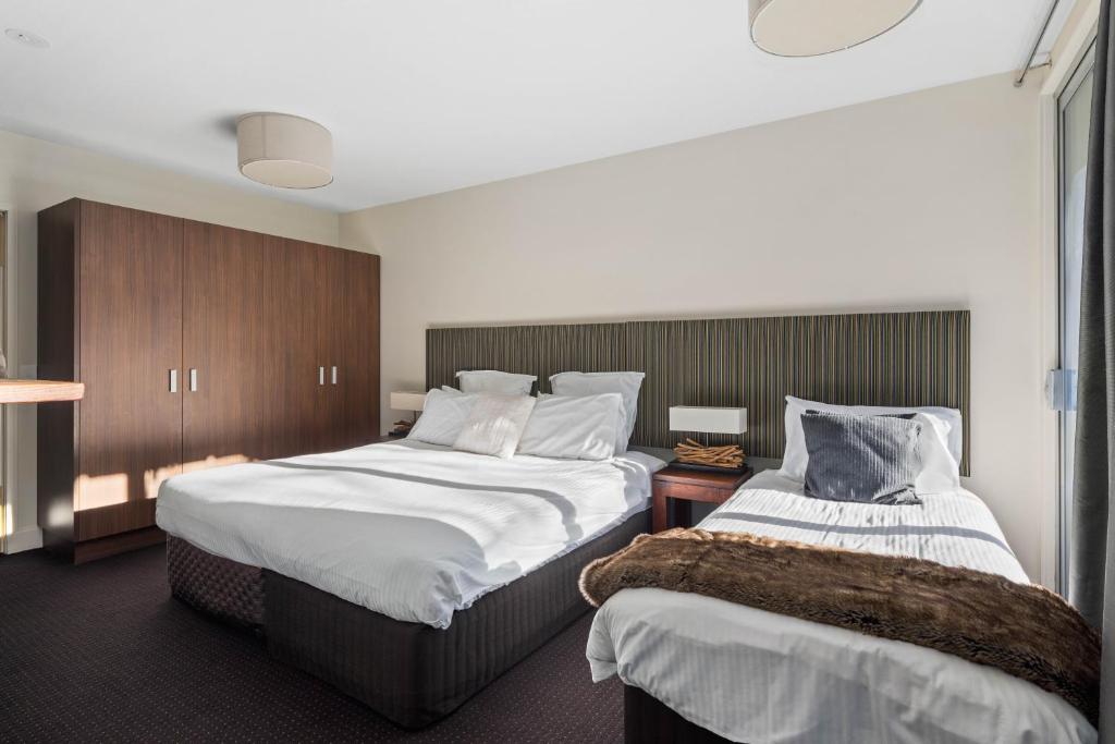 Postel nebo postele na pokoji v ubytování Kooloora Lodge
