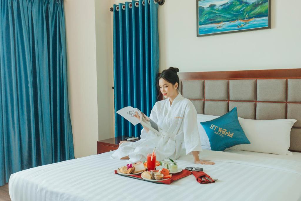 Postelja oz. postelje v sobi nastanitve SeaFront Hotel DaNang