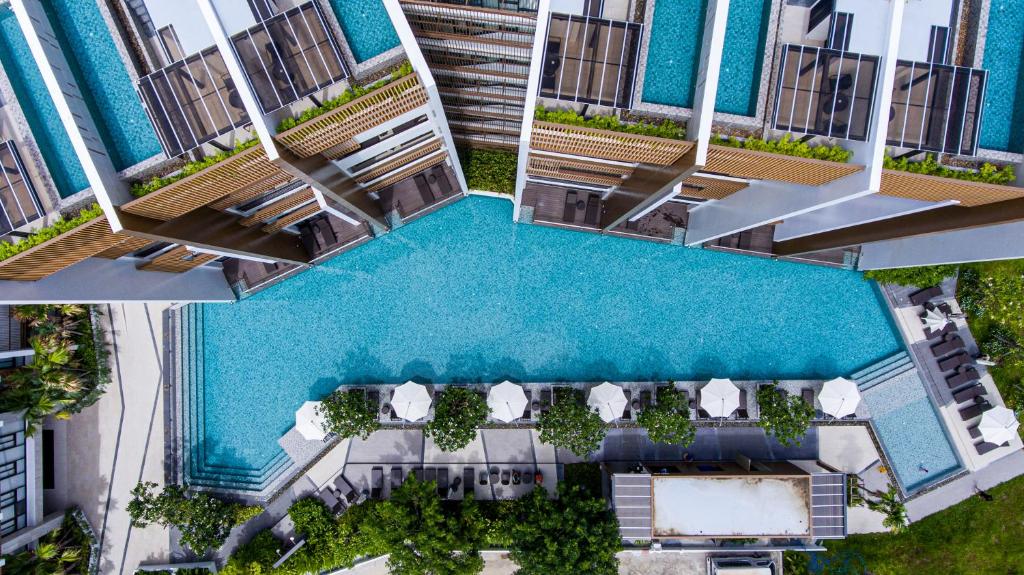 an overhead view of the pool at the resort at iSanook Resort & Suites Hua Hin in Hua Hin