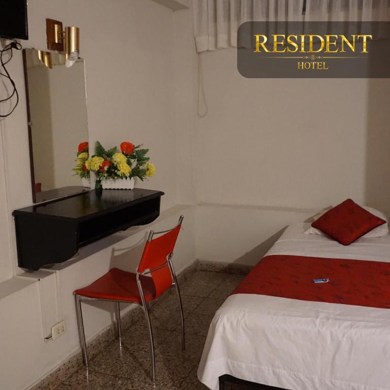 Postel nebo postele na pokoji v ubytování Hotel Resident Piura