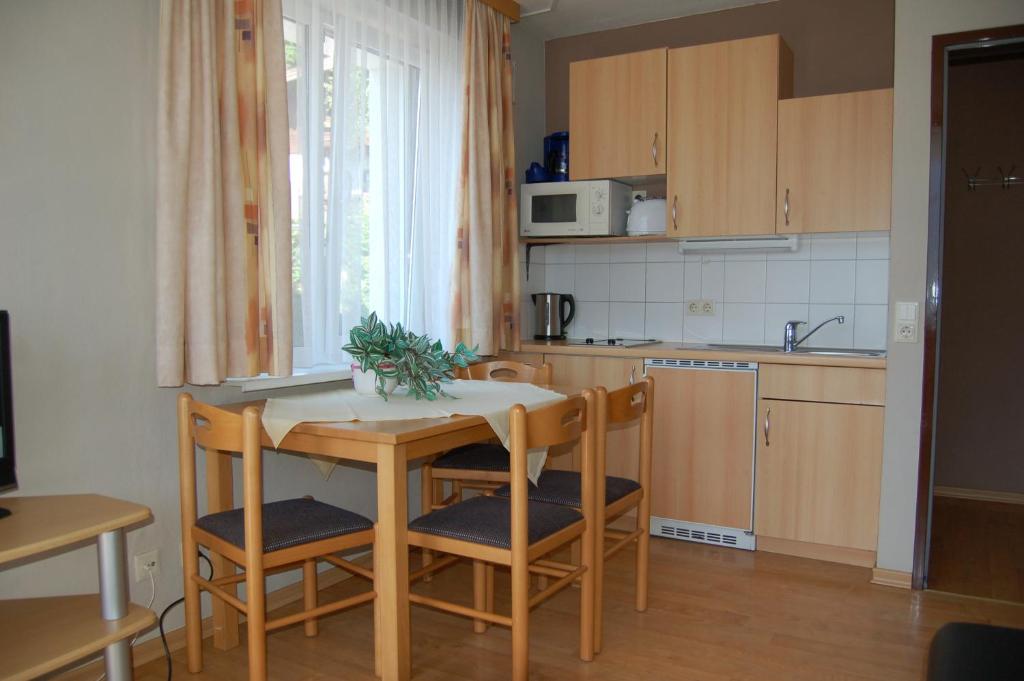 Kuchyňa alebo kuchynka v ubytovaní Appartement Alpensee