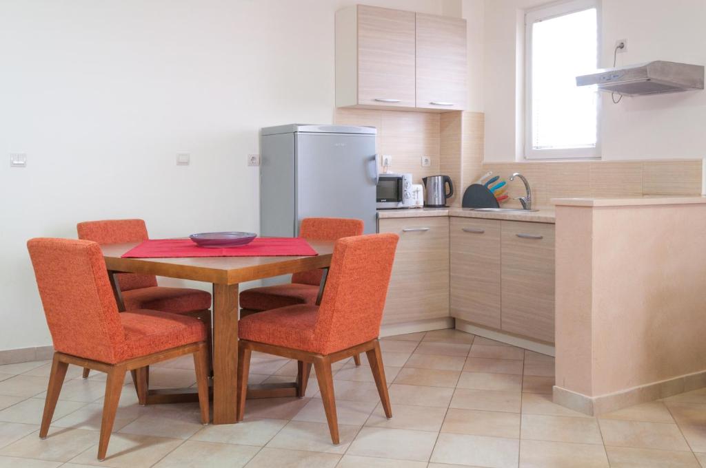 Kuchyň nebo kuchyňský kout v ubytování Apartments LILA AUREA