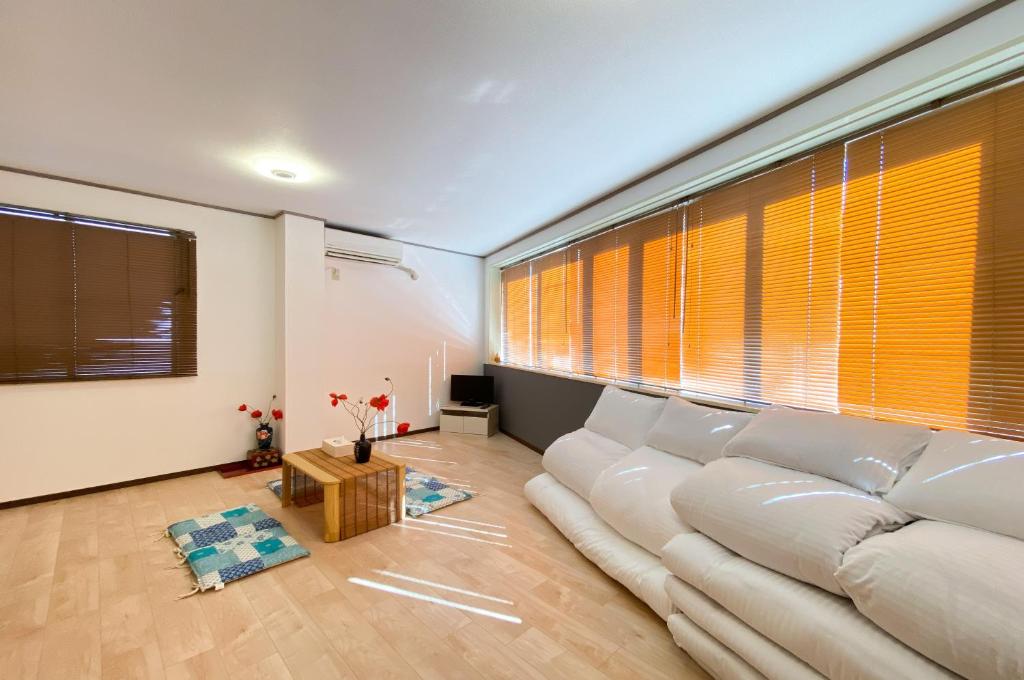 Posezení v ubytování Uhome Mitomi Home 3F