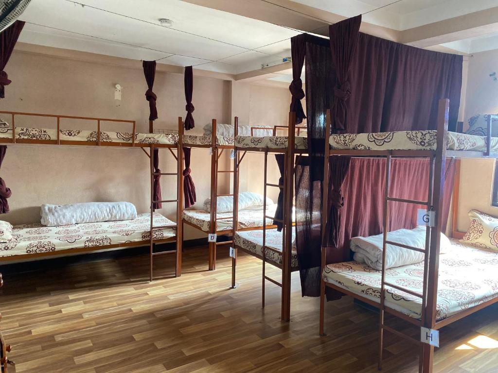 Postel nebo postele na pokoji v ubytování Planet Nomad Hostel