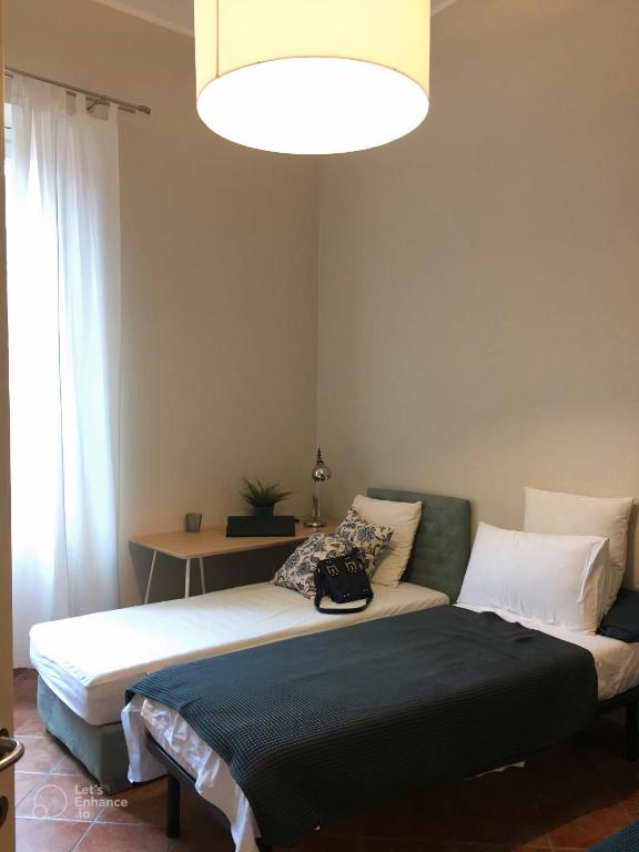 Postel nebo postele na pokoji v ubytování B&B Palazzo de "Il Nuovo Duca Minimo"