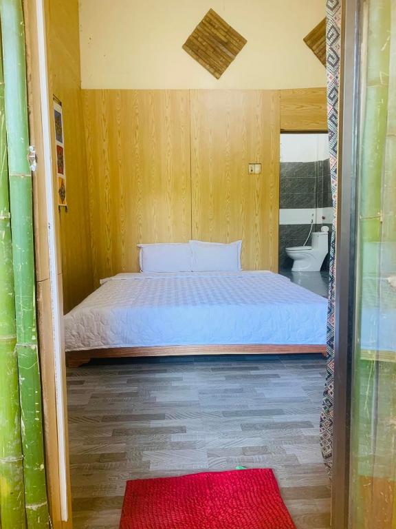 Postel nebo postele na pokoji v ubytování Green Homestay Mai Chau