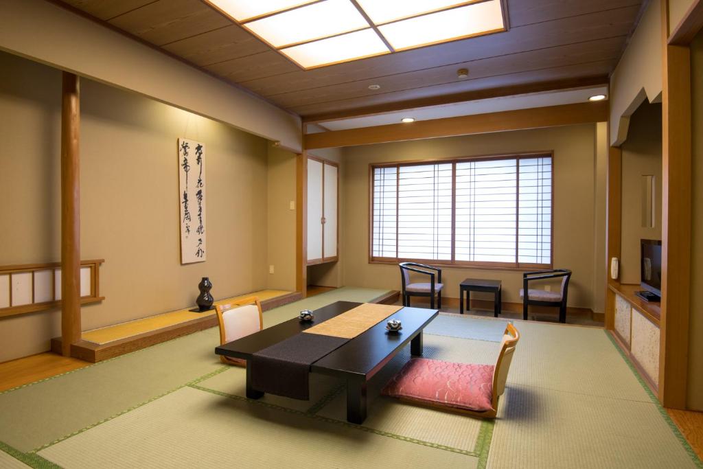 Posezení v ubytování Hotel Shirakawa Yunokura