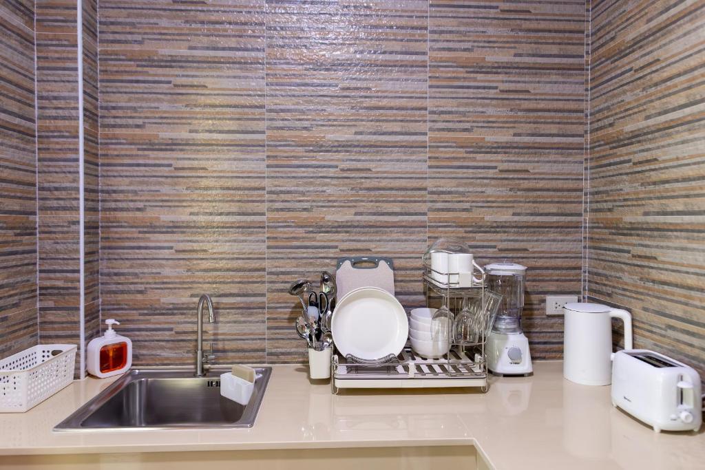 Kuchyň nebo kuchyňský kout v ubytování Apple Villas