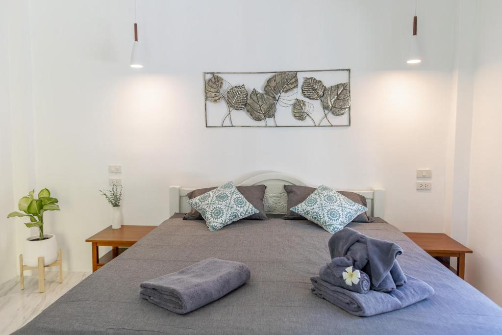 Postel nebo postele na pokoji v ubytování Apple Villas