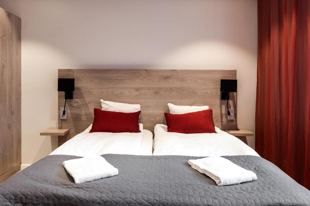 Postel nebo postele na pokoji v ubytování Dream - Luxury Hostel