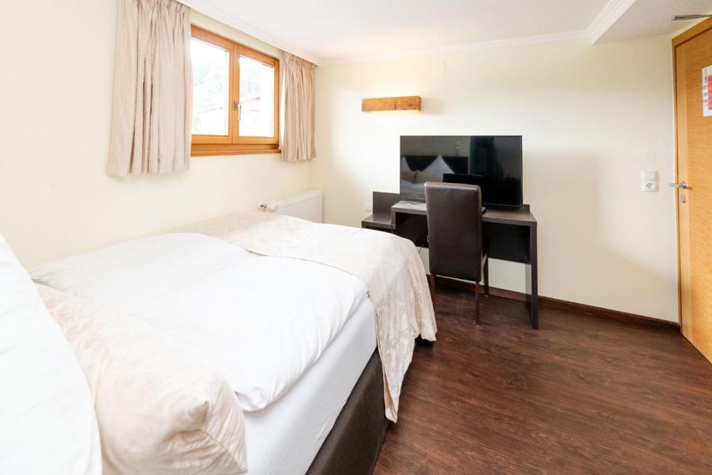 A bed or beds in a room at S'Matt 3