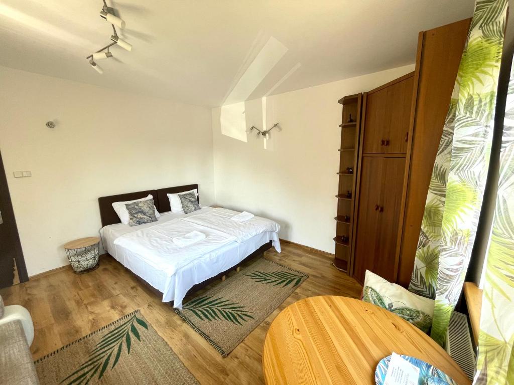 Postel nebo postele na pokoji v ubytování Wynajem Pokoi Villa Kofeina