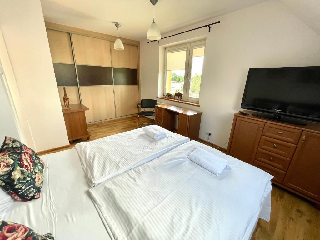 Posteľ alebo postele v izbe v ubytovaní Wynajem Pokoi Villa Kofeina