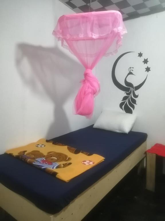Postel nebo postele na pokoji v ubytování Cozy House Hostel