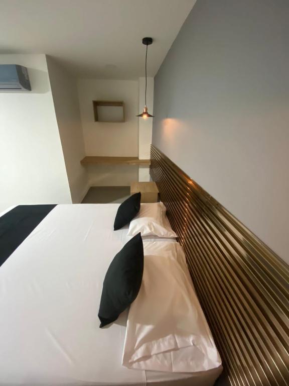 Postel nebo postele na pokoji v ubytování HOTEL ESTADIO DORADO