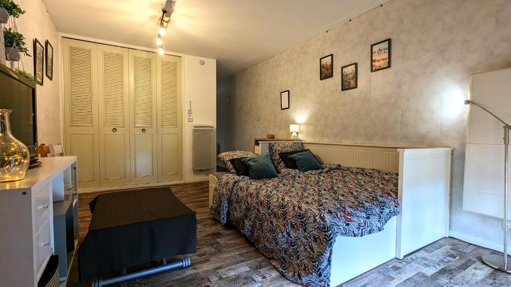 Posteľ alebo postele v izbe v ubytovaní Studio Le Banga d'Ax