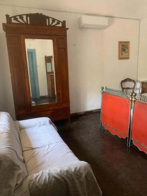 Postel nebo postele na pokoji v ubytování Casa Filù
