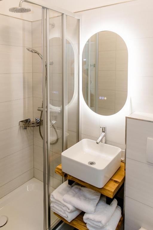 Koupelna v ubytování Aneton Garni Hotel
