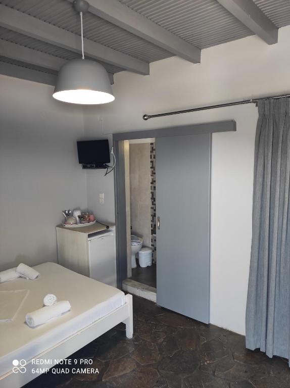 TV a/nebo společenská místnost v ubytování Protopapas Rooms