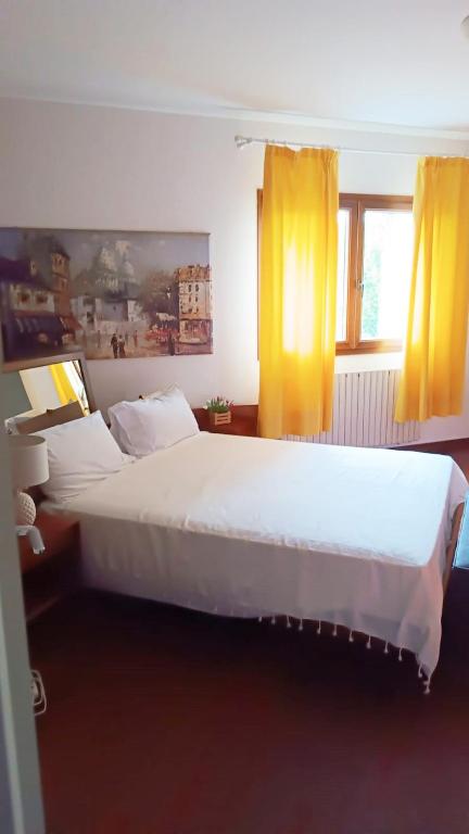 Postel nebo postele na pokoji v ubytování WhiteHome