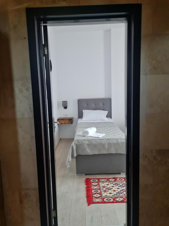 Postel nebo postele na pokoji v ubytování Conacul Ancuței