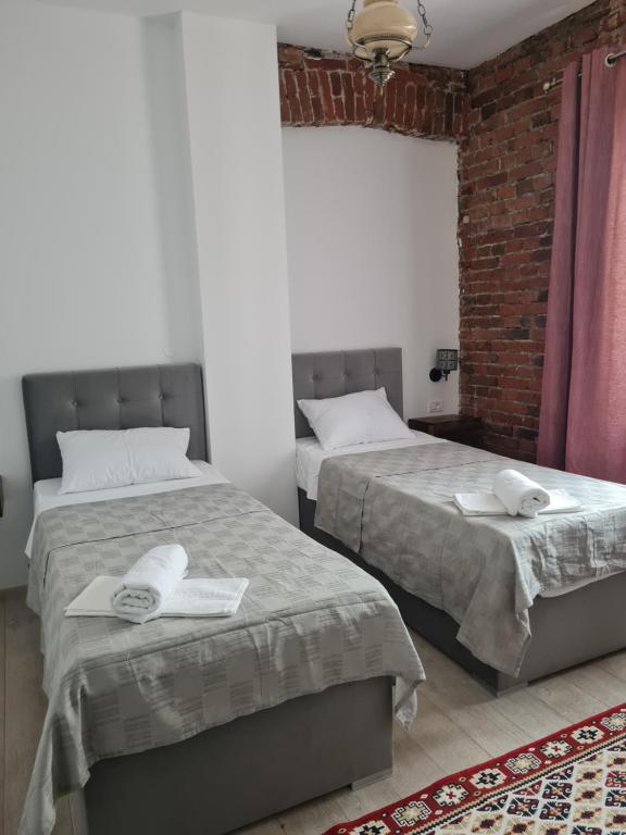 Postel nebo postele na pokoji v ubytování Conacul Ancuței