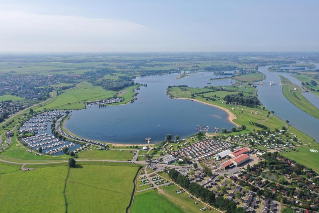 an aerial view of a park and a lake at Vakantiepark Eiland van Maurik in Maurik