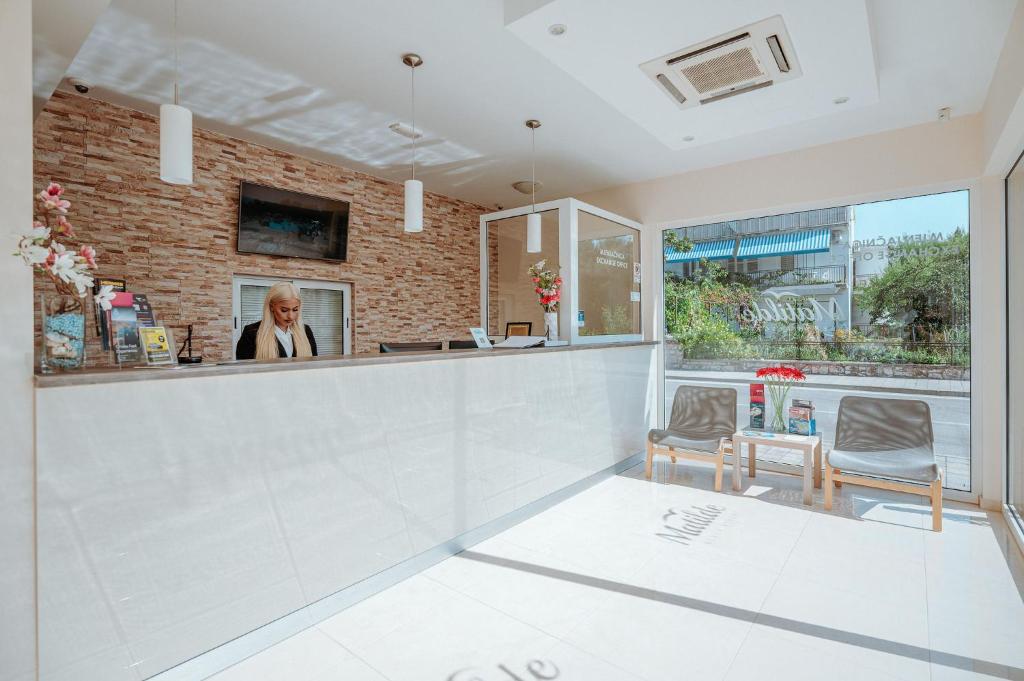 TV a/nebo společenská místnost v ubytování Matilde Beach Resort