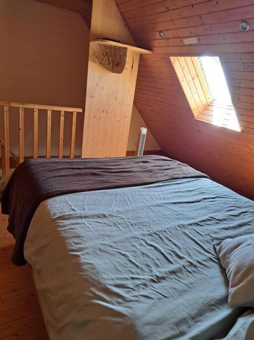 Postel nebo postele na pokoji v ubytování Le Nature