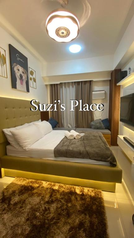 Postel nebo postele na pokoji v ubytování Suzi's Place @ Green 2 Residences Free Wi-fi & Netflix