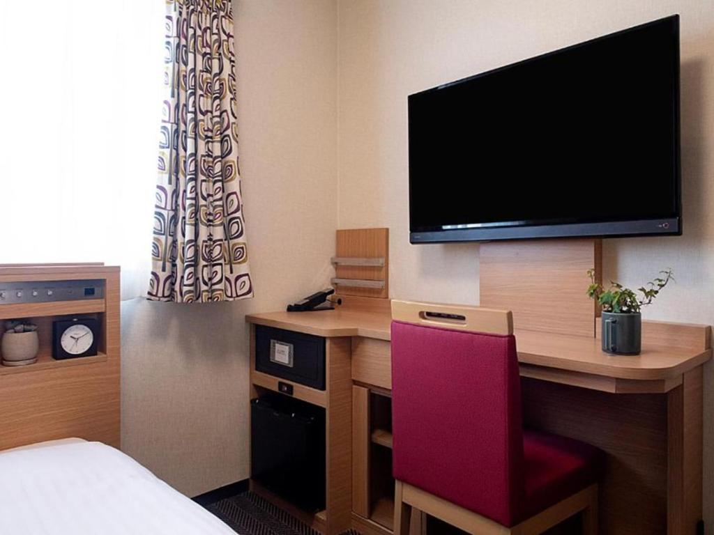 TV a/nebo společenská místnost v ubytování Nest&Rise Osaka Namba Hotel
